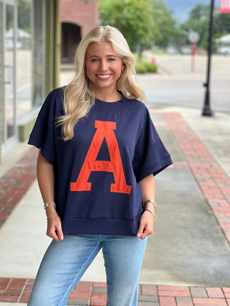 Stitched "A" top