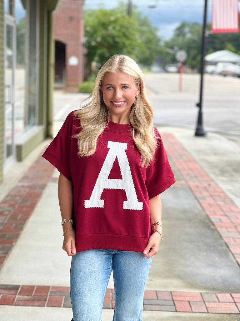 Stitched "A" top